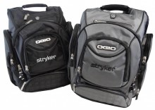 Ogio Metro backpack, Stryker logo embroidered on front.  Made of 420D dobby poly/600D poly.  Back panel has side entry padded laptop pocket, large center storage area, power cord and mouse storage, internal file sleeve, weatherproof fleece lined audio pocket with headphone exit port, weatherproof fleece lined digital media pocket, neoprene top grab handle, sternum strap, deluxe organizer panel, fits most 17" laptops.  Backpack approx. dimensions: 18"H x 13.5"W x 9"D.  Laptop sleeve dimensions: 15.5"H x 11.5"W x 2"D.